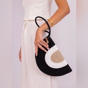 Intertwined Arc Curved Clutch in Black, Sand and Cream